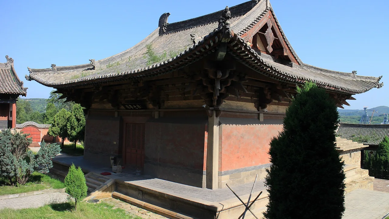 A small timber hall with curved eaves at Faxing Temple in Zhangzi county, Changzhi, one of the Black Myth: Wukong locations.