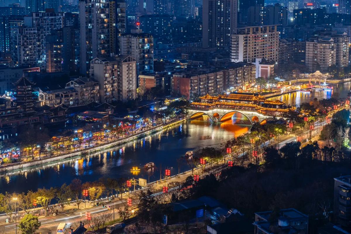 A traveler looks at a hand-drawn cultural map of Chengdu over a cup of jasmine tea.