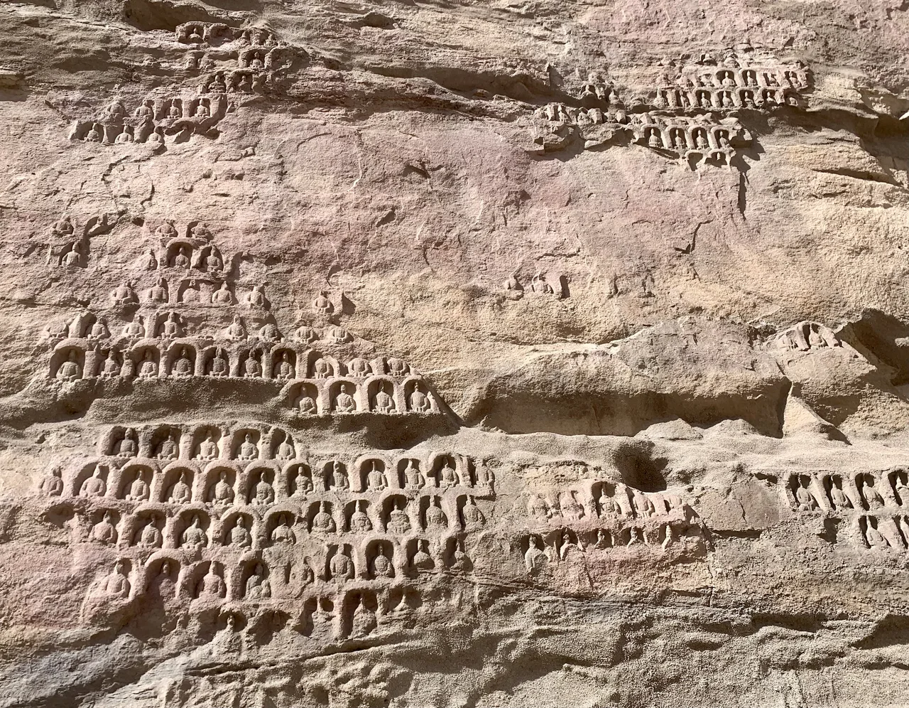 Cliff-face grotto façades and niches at Yungang Grottoes, Datong, Shanxi